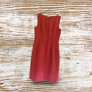 Sleeveless Ann Taylor coral dress with brocade pattern.